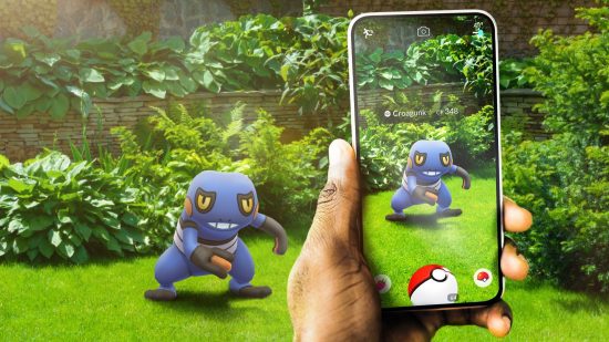 free Pokémon games: a trainer catching a Croagunk on their phone in a garden