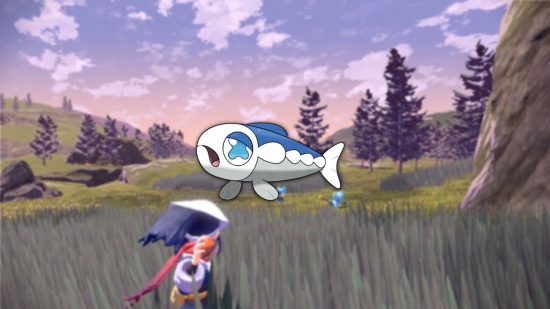 small Pokémon Wishiwashi in a field being caught by a trainer