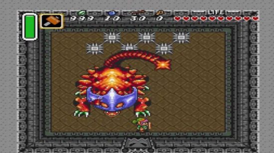 Zelda bosses: Link attacks the Helmasaur with a hammer
