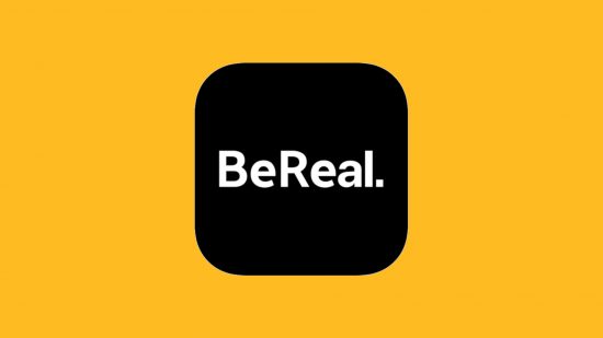 Be Real time: A mango rectangle graphic with the black BeReal app logo in the middle