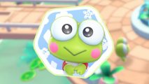 Hello Kitty Island Adventure critter list: A hexagonal sticker of Keroppi the frog in a white frame with a blue and white background, outlined in light green and pasted on a blurred background of the nature preserve from the game
