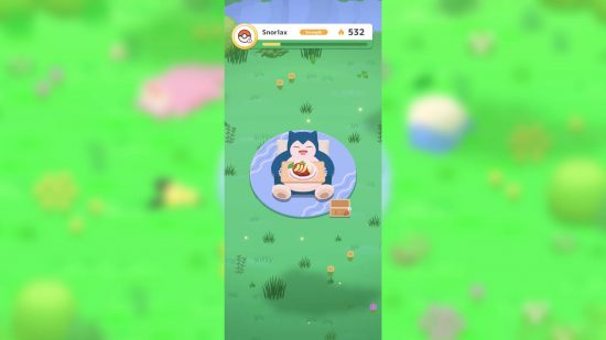 Pokémon Sleep review: a screenshot shows Snorlax eating a meal