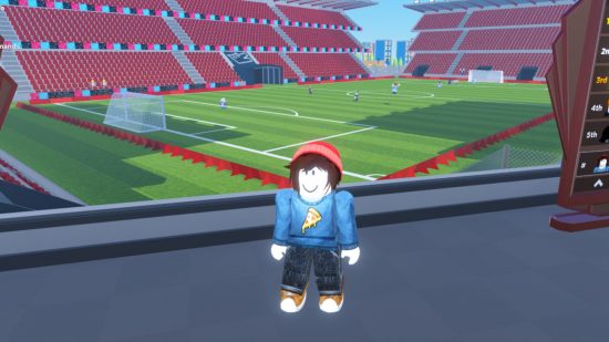 Super League Soccer codes header showing a character with a pizza symbol on a blue jumper and a red beanie over bushy brown hair. They are standing in front of a large football pitch with tall red bleachers and players on the pitch.