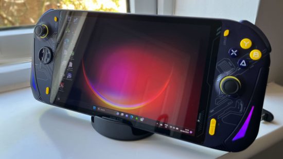 Aokzoe A1 review: the Aokzoe A1 showing Windows desktop on its screen as it sits on the Syntech docking station
