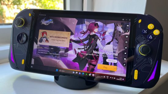 Aokzoe A1 review: the Aokzoe A1 sitting on the Syntech dockin station as it shows the Honkai Star Rail launcher on the screen