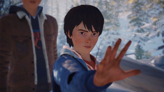 choice games Life is Strange - a boy holding up his hand in a snowy woodland