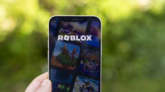 Roblox on the screen of an Apple iPhone 12