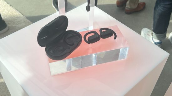A JBL SoundGear Sense headset sat on a pink table