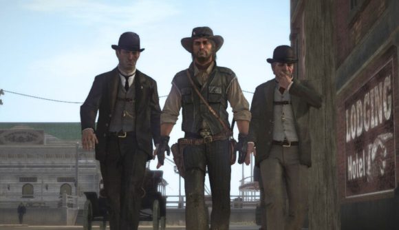 Read Dead Redemption Switch review screenshot showing three men walking through a town. The two either side are fancy, wearing suits, smoking cigars, with bowler hats and waistcoats and all. In the middle is a cowboy, all leather and replete with guns, wearing a scrappy hat and with scars on his face.