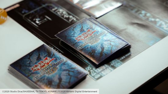 Picture of card sleeves from the Yu-Gi-Oh! Duel Links World Championships with sleeves from the TCG event