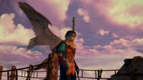 Baten Kaitos I & II HD Remaster review shot showing a man with blue hair and large wings standing in front of a cloudy blue sky.