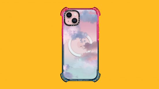 Best iPhone 15 Plus cases: A Casetify Bounce case with pink and blue edges and a cloudy sky design on a pink iPhone 15 Plus, pasted on a mango background