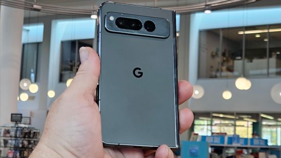 Google Pixel Fold review - our reviewer's hand holding up the phone
