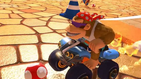 Mario Kart 8 Deluxe: DLC wave six: Funky Kong drives on a kart, with a mushroom in front of him