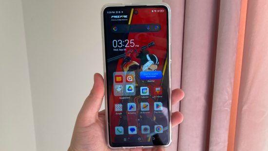 Tecno Pova 5 Pro 5G Free Fire Special Edition review: A photo of the Pova 5 Pro face on showing off the FF-themed home screen and app icons