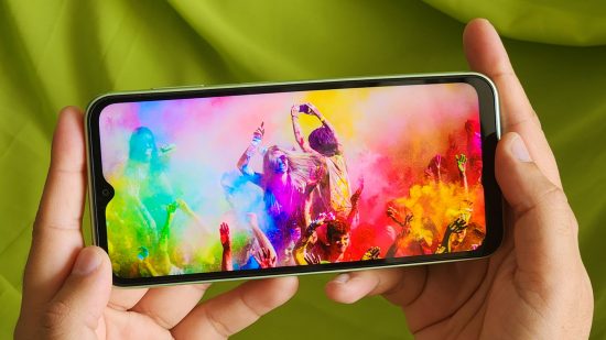 Picture of the Samsung Galaxy A14 5G displaying a colorful image for review of the phone