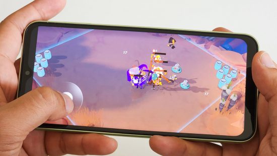 Image of playing a game on the Samsung Galaxy A14 5G for a review of the phone