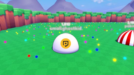 Blob Eating Simulator codes: A grey-white blob with the PT logo in a mango circle on top of it. The blob sits in a bright green field surrounded by tiny rainbow-coloured blobs. Off to the side is a red and white striped blob, representing another player.