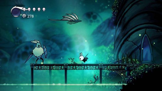 Hollow Knight review: The Knight explores a green area and attacks an enemy