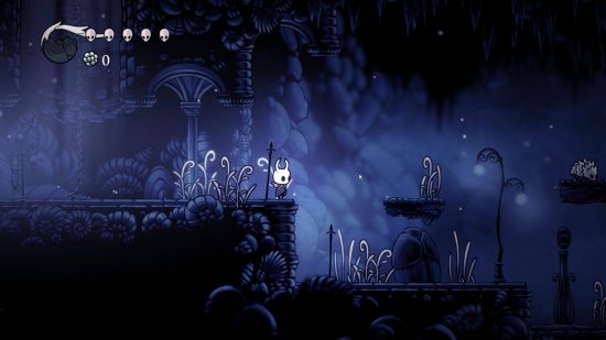 Hollow Knight review: The Knight stands and surveys a gloomy level