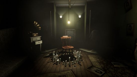 Indie horror games - a screenshot of Madison, showing a chair surrounded by candles beneath a hanging lightbulb