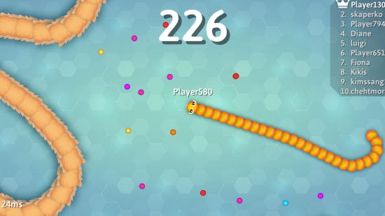 A screenshot of one of the best io games, Snak.io, showing a player snake slithering around collecting colorful dots 