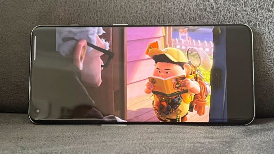 Picutre of the display on the OnePlus 11 5G while watching the Disney film Up for a review of the phone