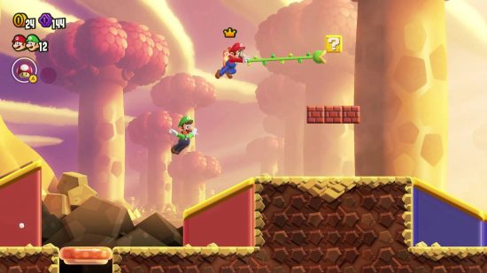 Super Mario Bros. Wonder review: Mario uses a grappling vine to reach a ledge