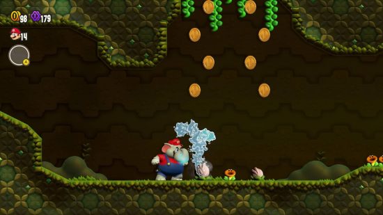 Super Mario Bros. Wonder review: Elephant Mario throws water on a wilted flower