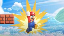 Super Mario Bros Wonder review: Mario leaps into the air, and effects around him indicate he has a mushroom power-up