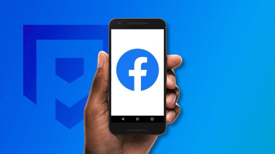 What is Facebook: A dark skinned hand holding a phone up with the blue Facebook logo on a white background. This is pasted on a Facebook-blue PT background