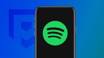 What is Spotify: An iPhone showing the green Spotify logo on a black background pasted on a dark blue PT background