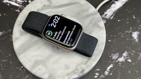 Custom image for Apple Watch Series 9 review with a top down view of the device showing notifications