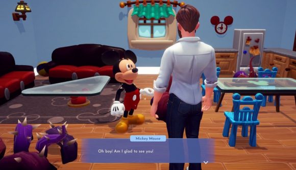 Best iPad games: Disney Dream Light Valley. Image shows Mickey Mouse talking to a man in his house. Text reads 