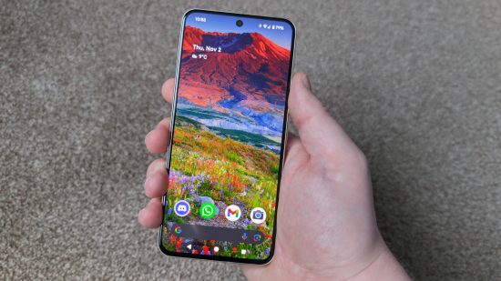 Custom image of the Google Pixel 8 in someones hand for a review of the phone