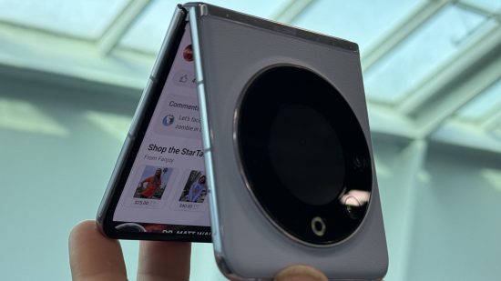 Custom image of the Tecno Phantom V Flip half folded for a review of the phone
