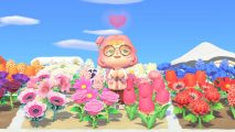 Animal Crossing Christmas joy: Daz's ACNH character with pink wavy hair and an orange fringe, heart-emoting in a field of rainbow-colored flower patches, with a relatively clear blue sky above and snow on the ground