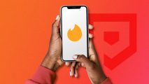 How to cancel Tinder Gold - two hands holding a phone with the Tinder Gold logo on the screen