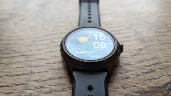 Custom image of the watch lying flat with sunset digital display for Mobvoi Ticwatch Pro 5 review