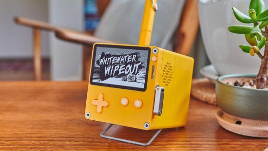 Super Pocket review - the Playdate console sitting on its stand