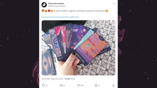 Cosmic Wheel Sisterhood tarot in games: A screenshot of a tweet from Deconstructeam showing off a printed-out deck from the game, pasted on a screenshot from the game