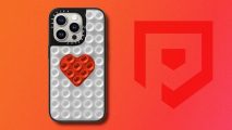 Best iPhone cases: The Casetify Stick-It case in white with a red heart in the middle and a black bezel, offset to the left of the image on a red PT background