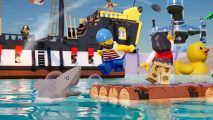 Fortnite Lego Islands: A close-up of the key art for Lego Raft Survival showing a Lego pirate with a blue kerchief on his head and a brown moustache jumping back from a Lego shark tryin to bute the raft. A large pirate ship is in the background