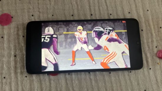 Custom image for the Poco C65 review showing the phone displaying YouTube with American footballers on screen