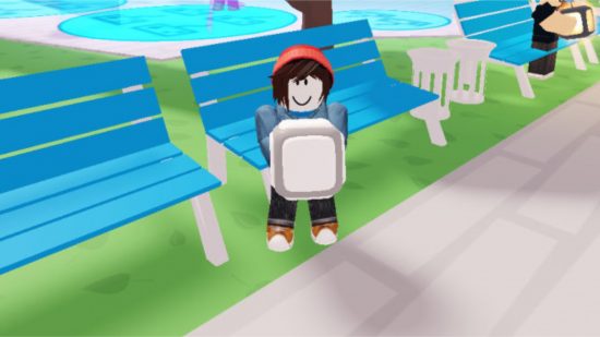 Roblox Party codes - an avatar in a red beanie stood on the grass in front of blue benches holding a die