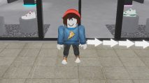 Sneakder Resell Simulator codes: An avatar in a read beanie and pizza jumper stood in front of a shop with sneakers in the window