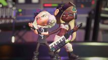 Splatoon characters Pearl and Marina wearing dark clothes holding a keytar