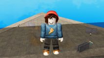 Bending Battlegrounds codes: an avatar in a blue pizza jumper and red beanie in front of an arena below the blue sky