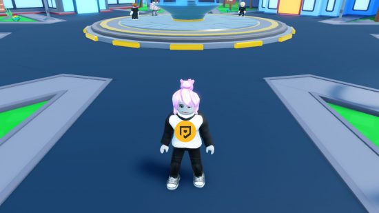 a character standing in front of a fountain in Coding Simulator