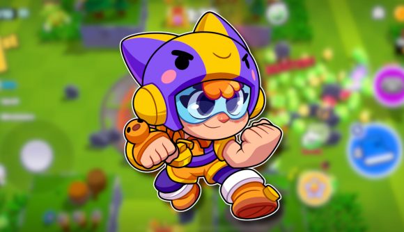 Squad Busters interview: A cute Squad Busters character with a cat helmet on her head holding up her fists, outlined in white and pasted on a blurred game screenshot